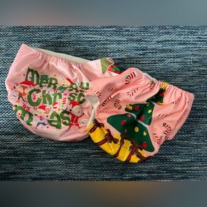 Set of two Christmas pink baby cloth diapers.  Like new.  Excellent condition.
